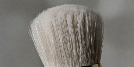 Close-up of tightly bundled synthetic makeup brush bristles showing uniform filament alignment